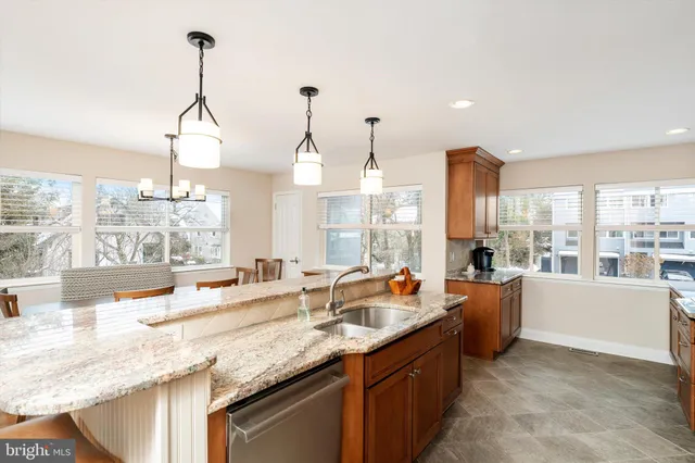 a room with lots of counter space and windows