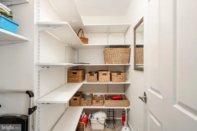 a children room with furniture and a window