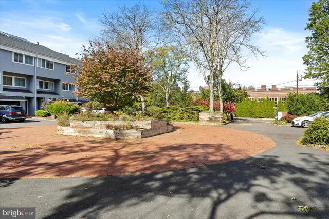 a view of road with houses
