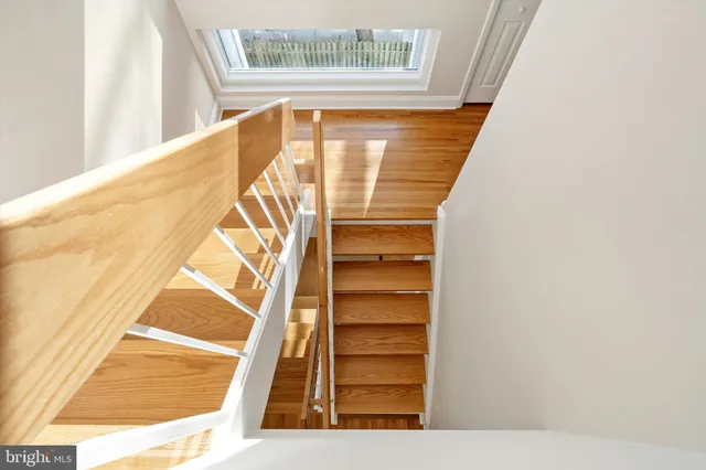 a bed room with a bed and a chandelier