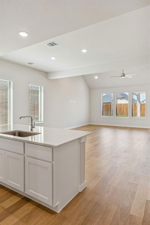 1132 Del Rio Drive Lavon, TX 75166 - Photo 11 of 39 Open First Floor in the Stanley II home plan by Trophy Signature Homes – REPRESENTATIVE PHOTO