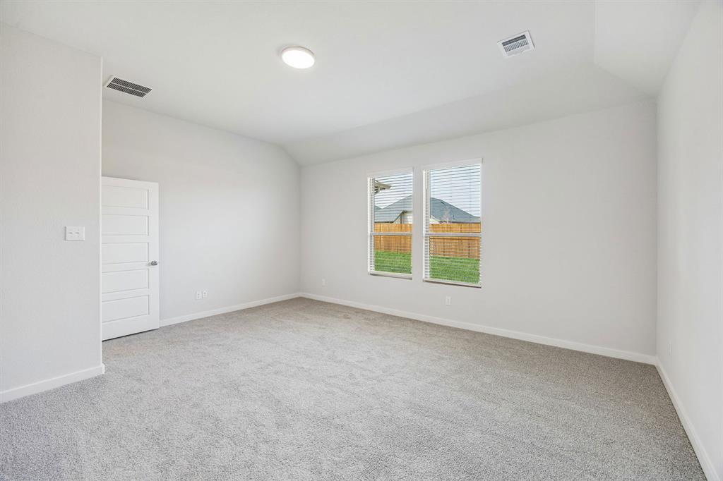 1132 Del Rio Drive Lavon, TX 75166 - Photo 21 of 39 Primary Suite in the Stanley II home plan by Trophy Signature Homes – REPRESENTATIVE PHOTO