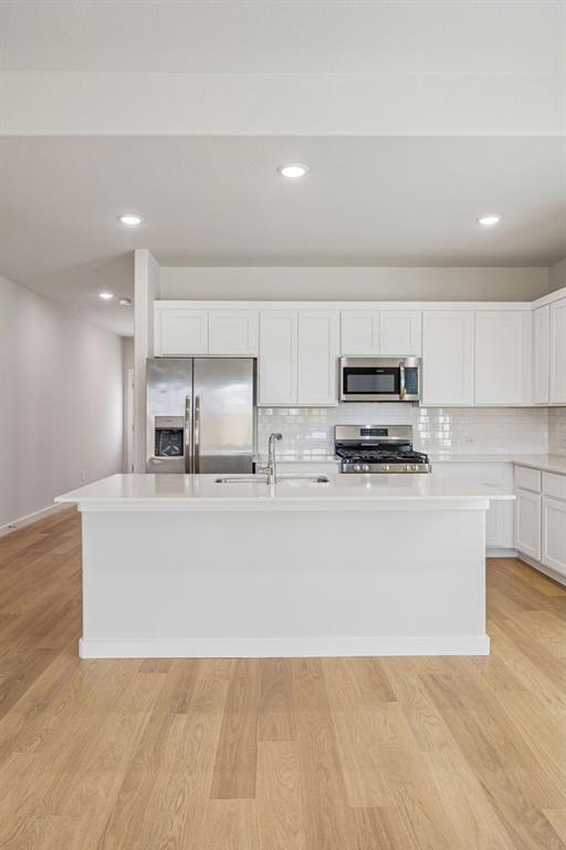 1132 Del Rio Drive Lavon, TX 75166 - Photo 8 of 39 Kitchen in the Stanley II home plan by Trophy Signature Homes – REPRESENTATIVE PHOTO