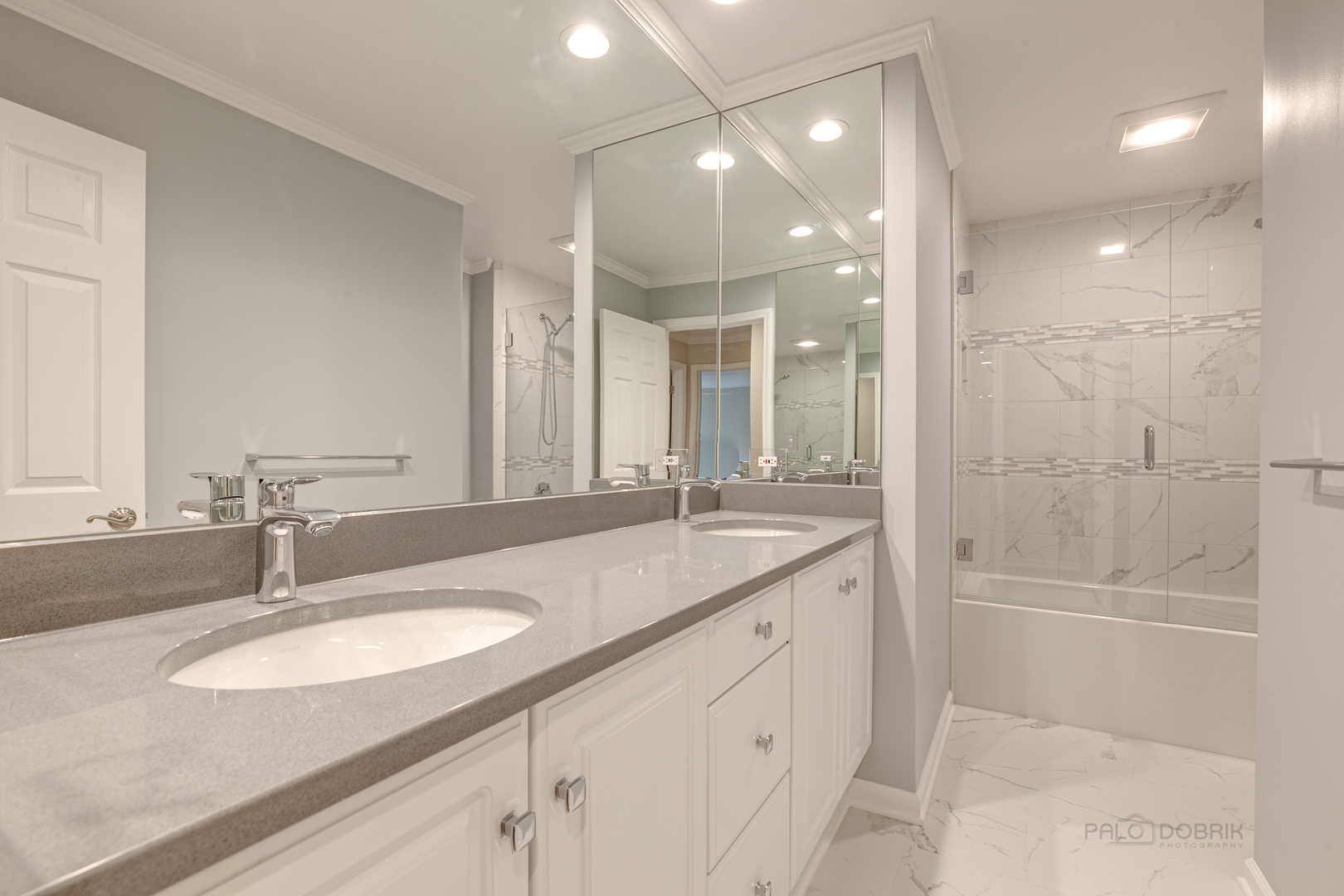 1127 South Ridge Road Lake Forest, IL 60045 - Photo 22 of 35 a bathroom with a granite countertop sink mirror and a shower