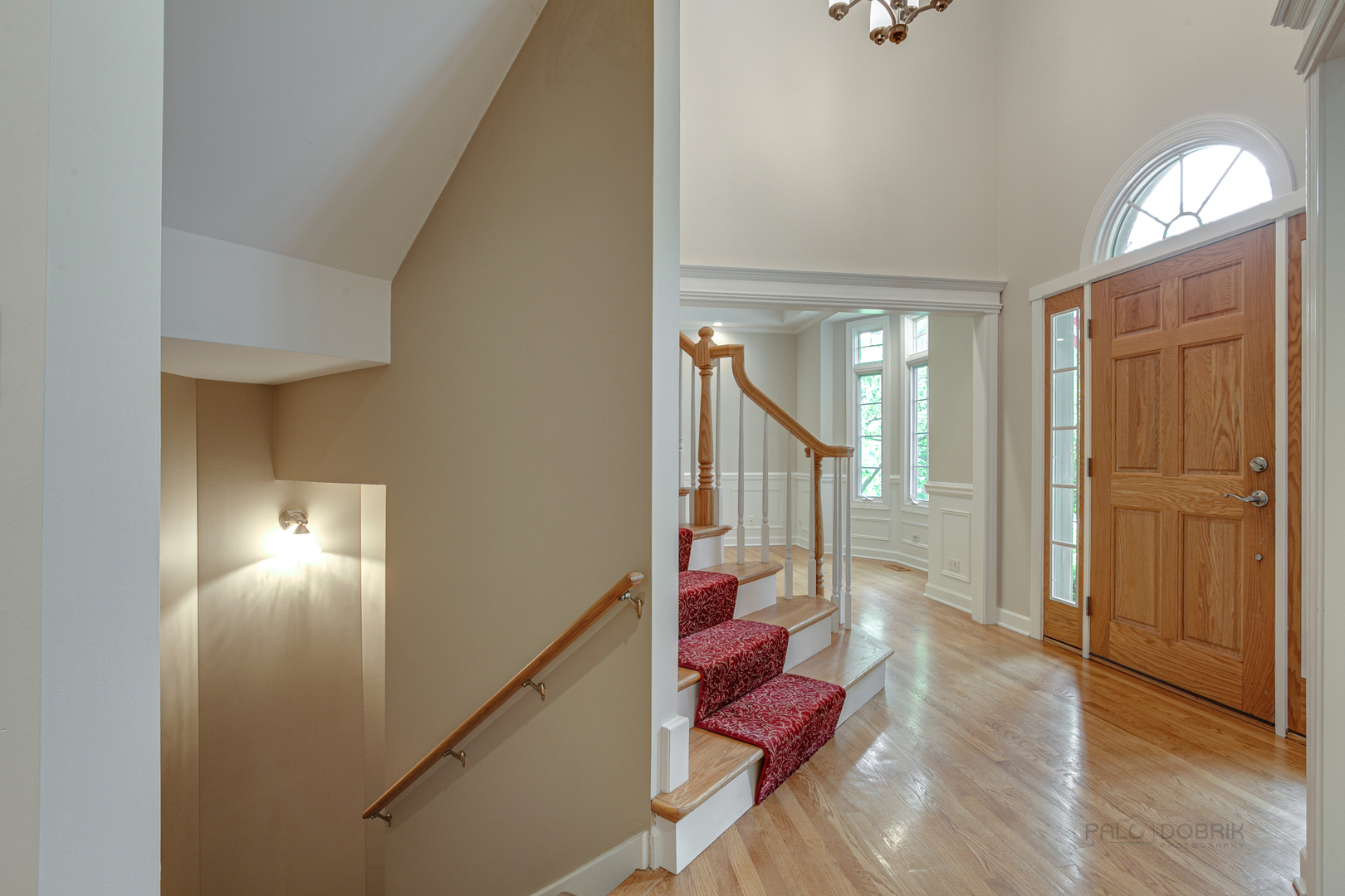 1127 South Ridge Road Lake Forest, IL 60045 - Photo 4 of 35 a view of entryway and hall with wooden floor