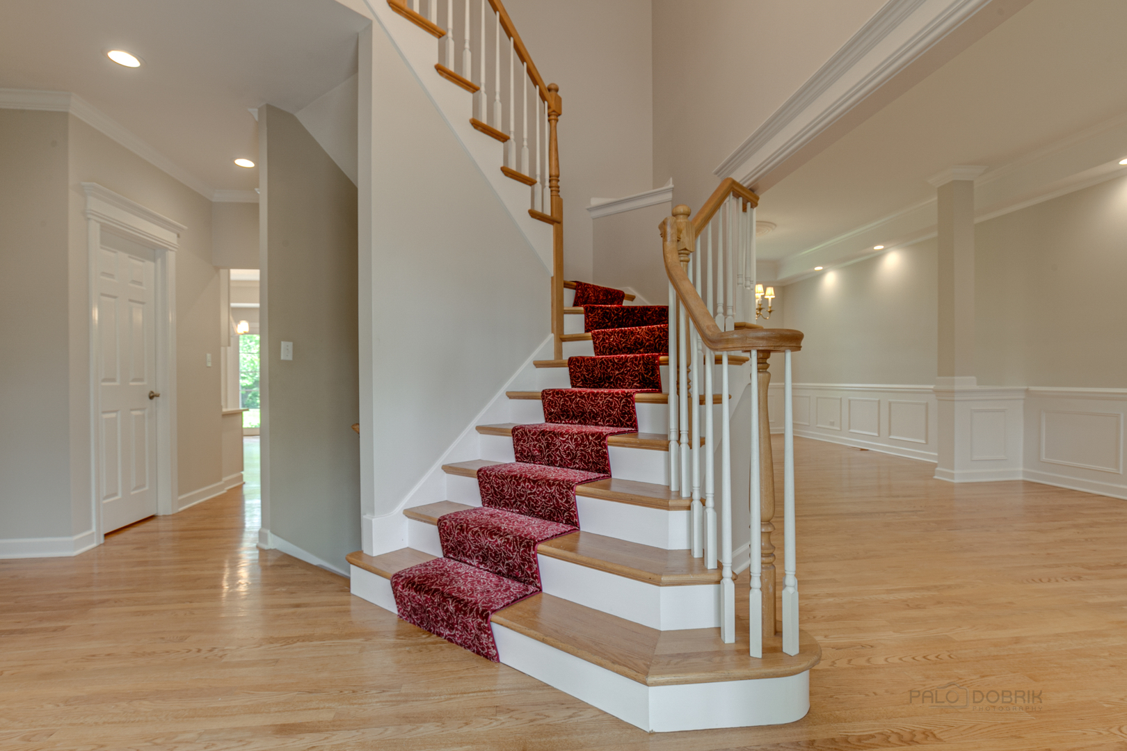 1127 South Ridge Road Lake Forest, IL 60045 - Photo 5 of 35 a view of entryway and hall with wooden floor