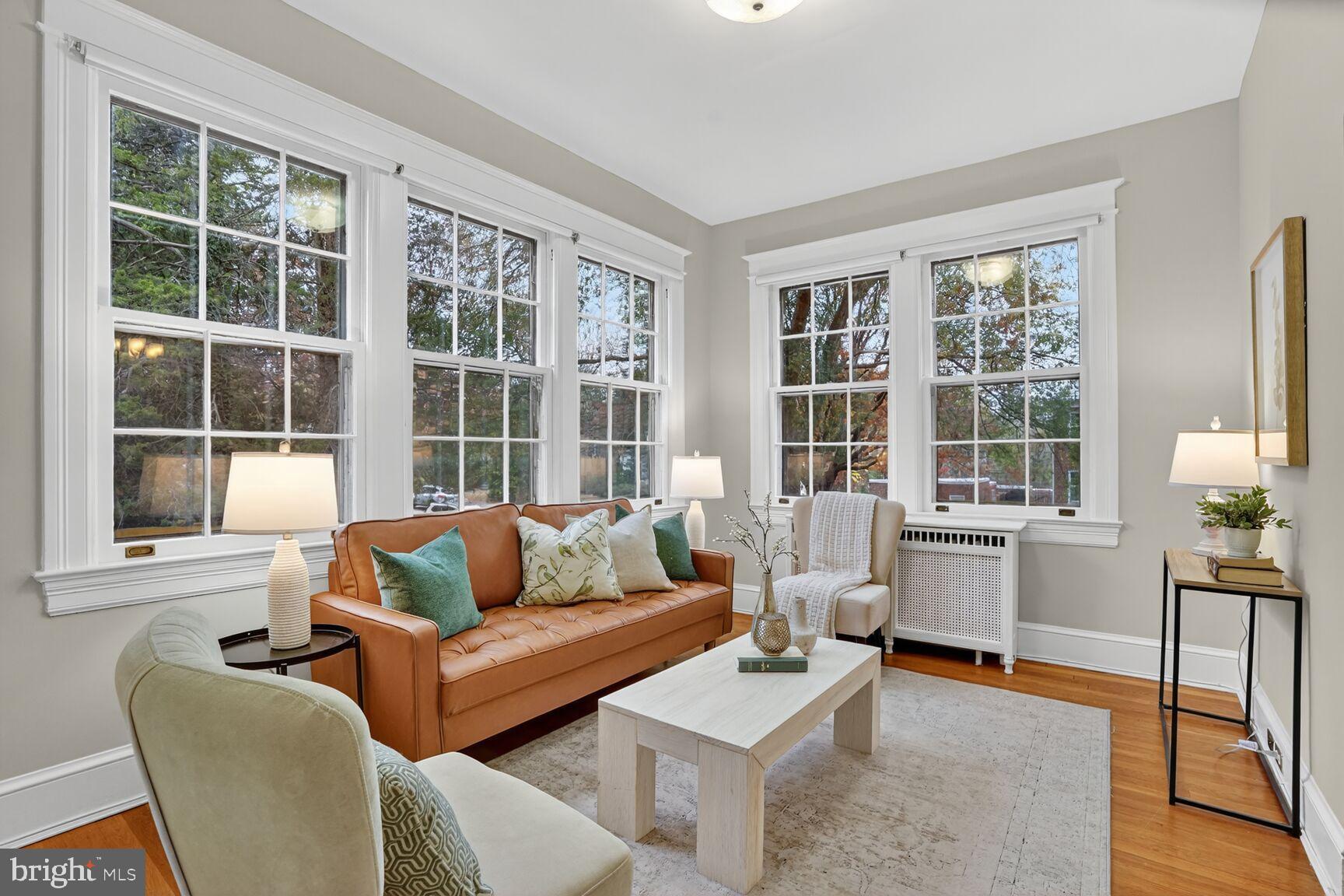 4214 37th Street Northwest Washington, DC 20008 - Photo 11 of 41 a living room with furniture and a window