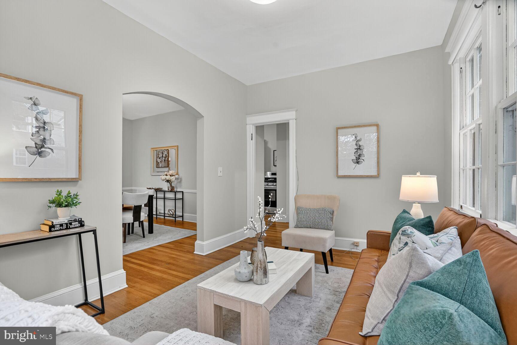 4214 37th Street Northwest Washington, DC 20008 - Photo 12 of 41 a living room with furniture and wooden floor