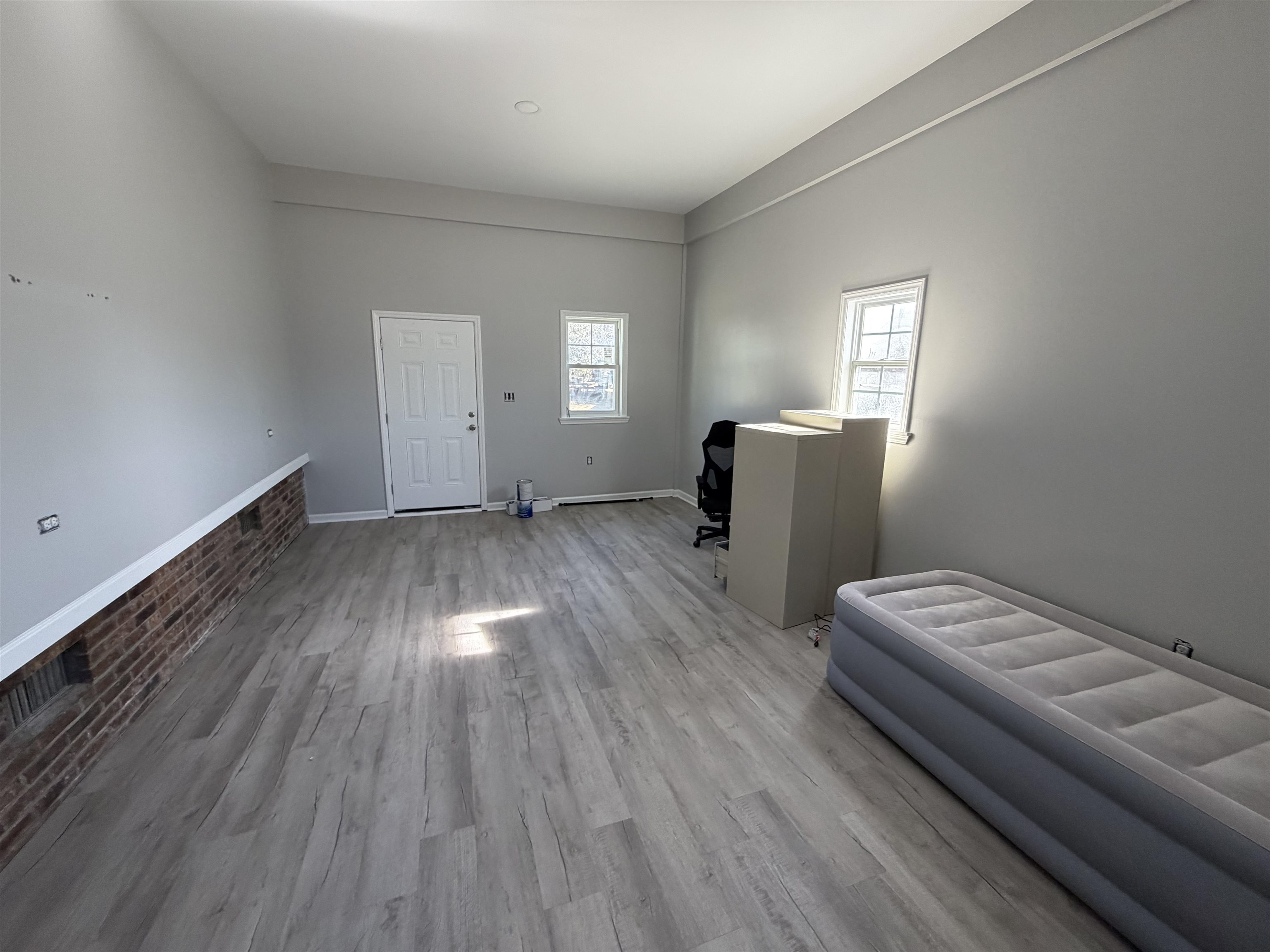 607 Geddings Drive Myrtle Beach, SC 29588 - Photo 15 of 21 Unfurnished living room featuring light wood-type flooring and a desk