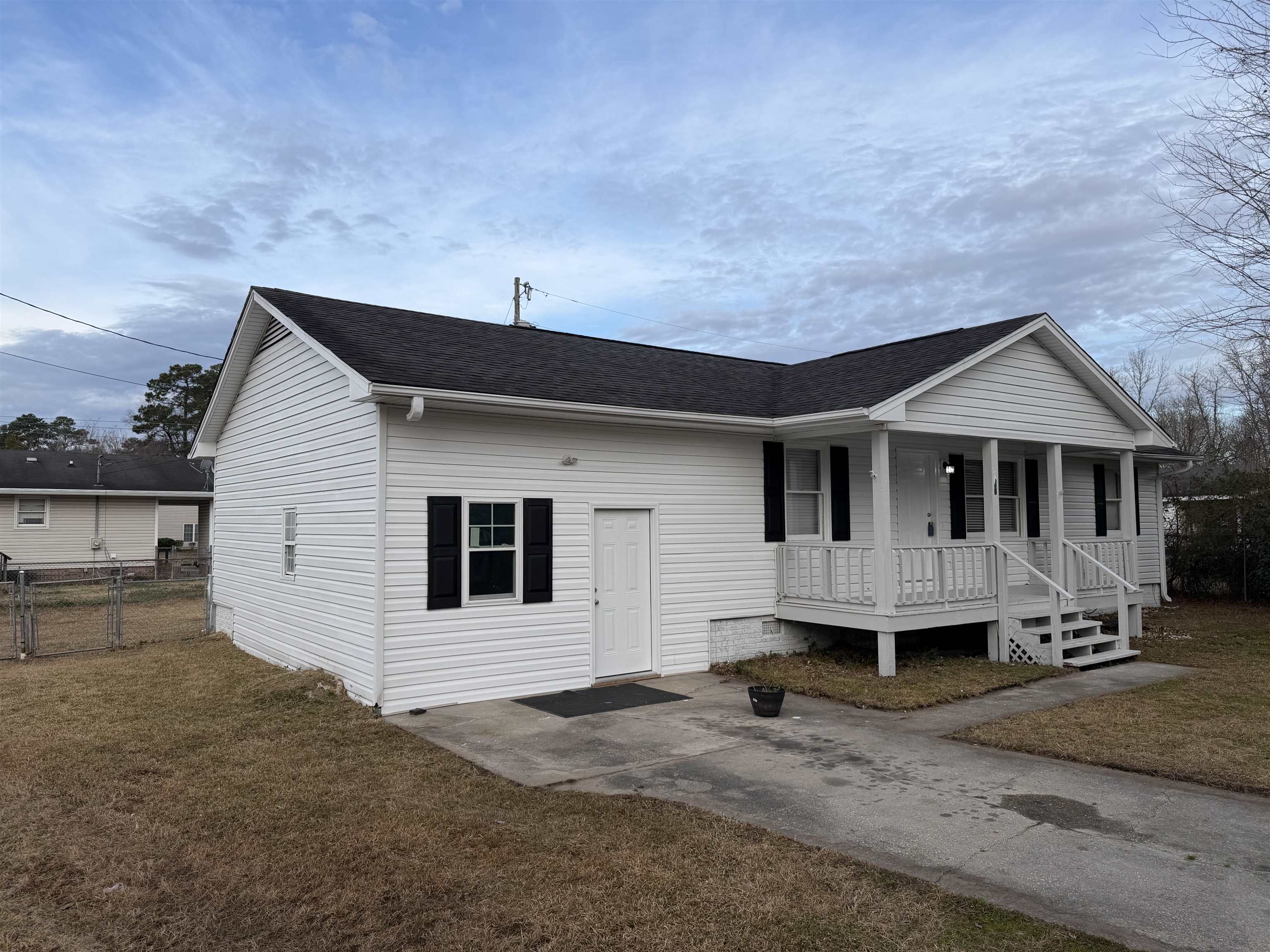607 Geddings Drive Myrtle Beach, SC 29588 - Photo 18 of 21 View of front of home with a shingled roof, covered porch, and a gate