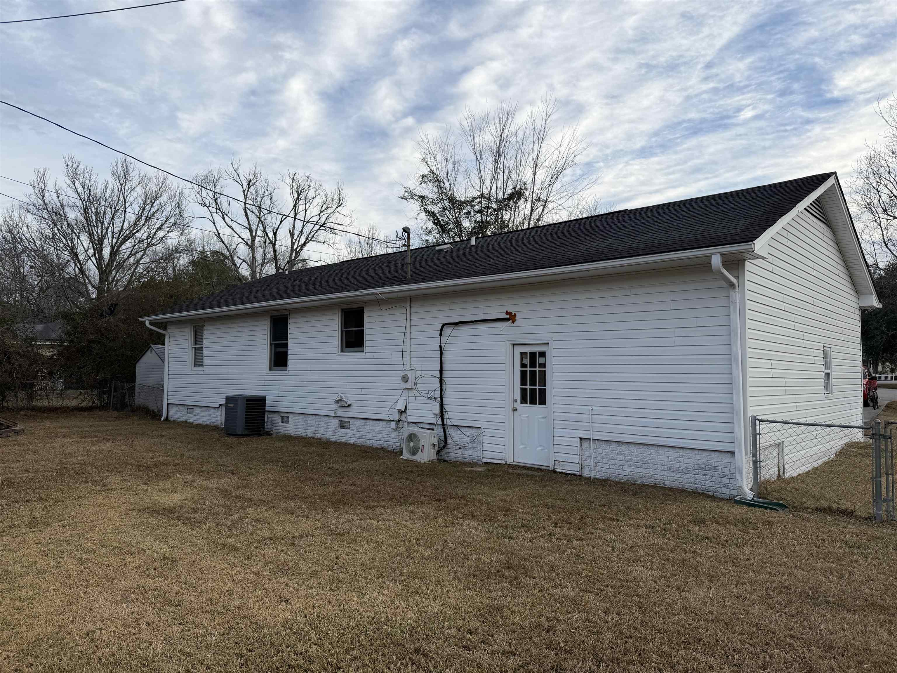 607 Geddings Drive Myrtle Beach, SC 29588 - Photo 19 of 21 Rear view of property featuring crawl space and roof with shingles