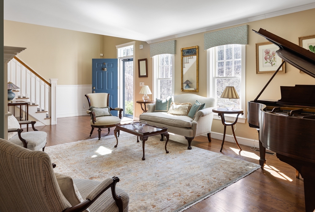 55 Depot Road Boxford, MA 01921 - Photo 18 of 42 a living room with furniture a rug and a window