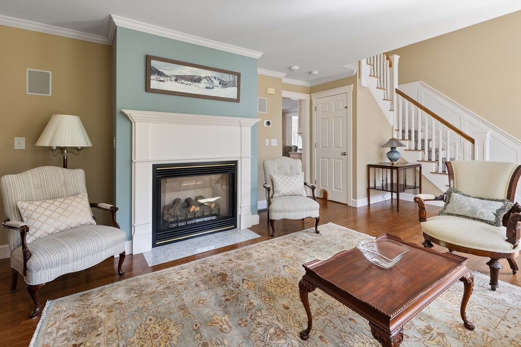 55 Depot Road Boxford, MA 01921 - Photo 19 of 42 a living room with furniture and a fireplace
