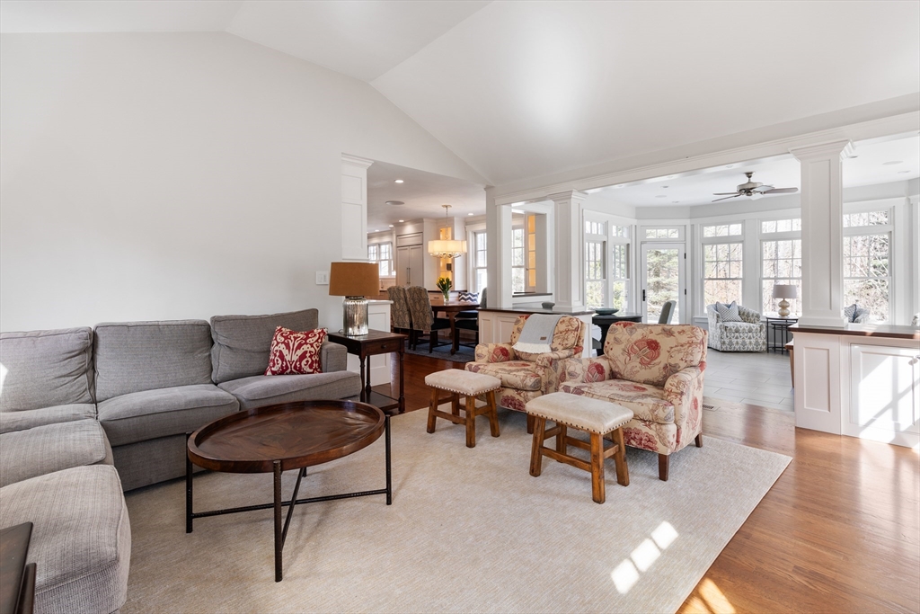 55 Depot Road Boxford, MA 01921 - Photo 21 of 42 a living room with furniture wooden floor and a large window