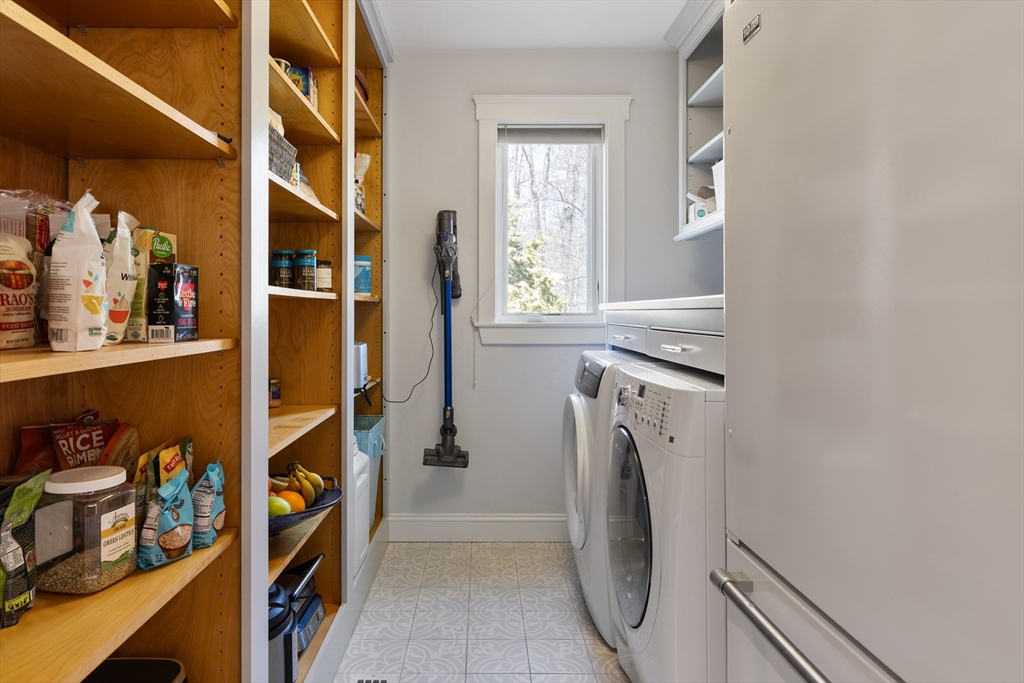 55 Depot Road Boxford, MA 01921 - Photo 25 of 42 a view of walk in closet with clothes and shoes