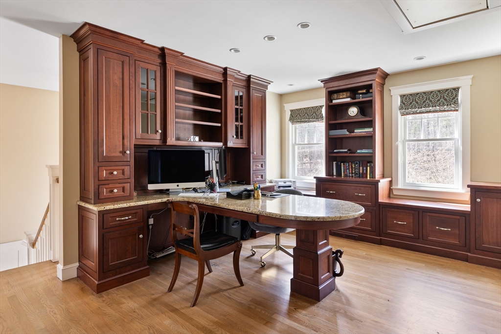 55 Depot Road Boxford, MA 01921 - Photo 27 of 42 a view of a workspace with furniture and a window