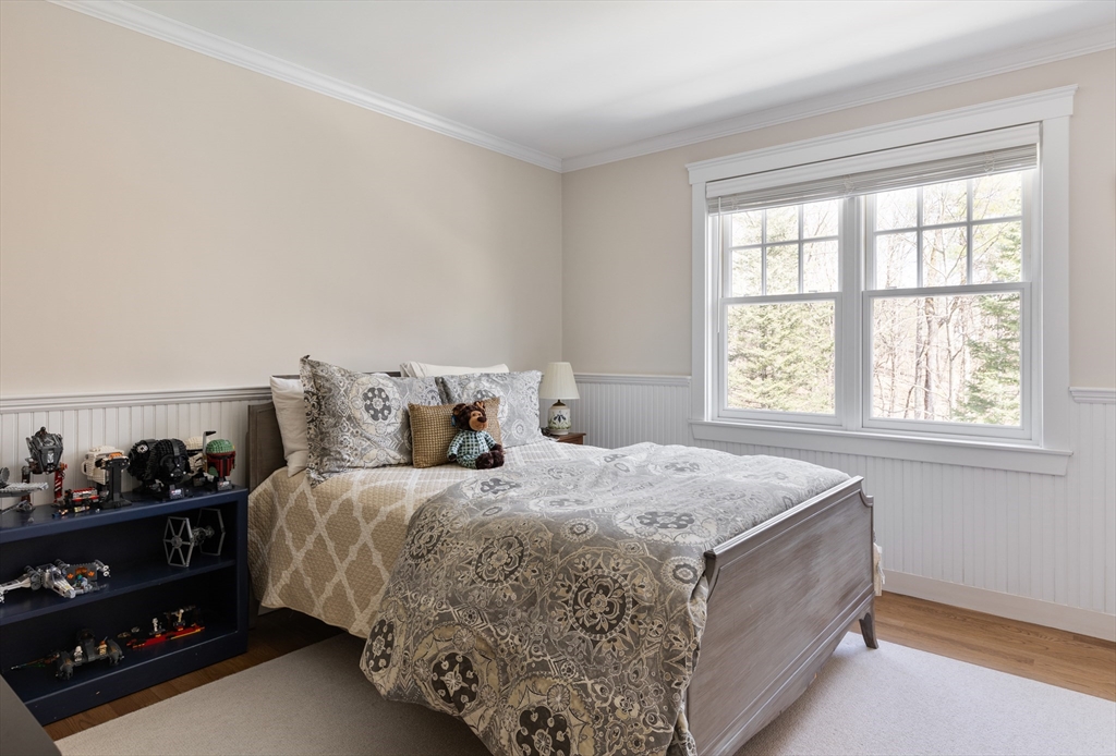 55 Depot Road Boxford, MA 01921 - Photo 29 of 42 a bedroom with a bed and a window