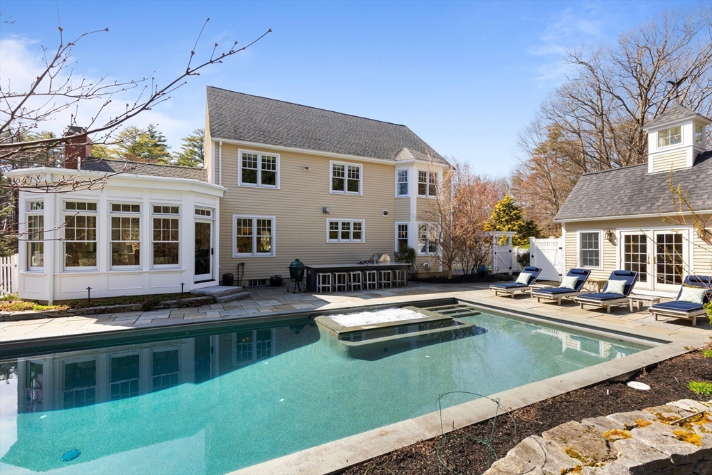 55 Depot Road Boxford, MA 01921 - Photo 3 of 42 a view of a house with pool fire pit couches and chairs