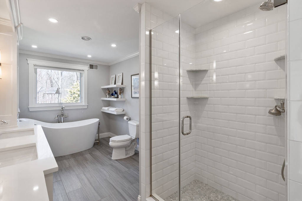 55 Depot Road Boxford, MA 01921 - Photo 34 of 42 a spacious bathroom with a bathtub shower sink vanity and a toilet