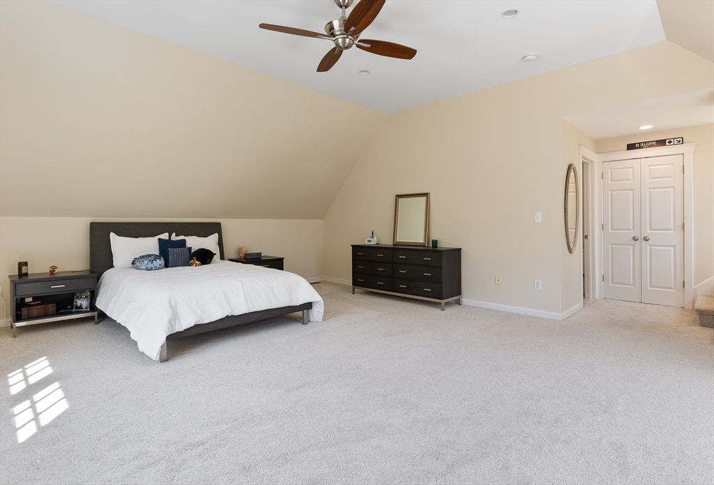 55 Depot Road Boxford, MA 01921 - Photo 35 of 42 a bedroom with a bed and dresser