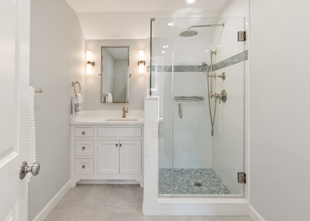 55 Depot Road Boxford, MA 01921 - Photo 36 of 42 a bathroom with a shower sink and mirror