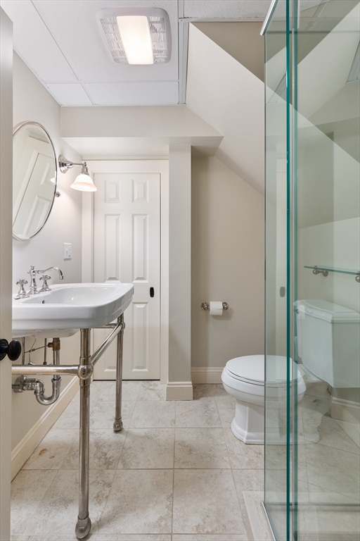 55 Depot Road Boxford, MA 01921 - Photo 40 of 42 a bathroom with a sink a toilet and a mirror