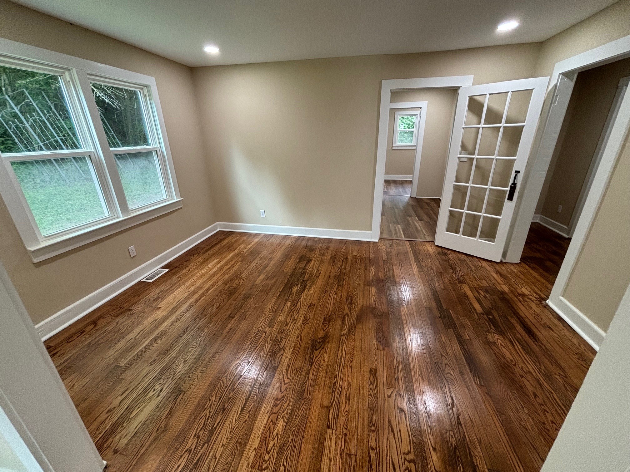 2692 Marble Hill Road Mulberry, TN 37359 - Photo 7 of 11 a view of an empty room with wooden floor and a window