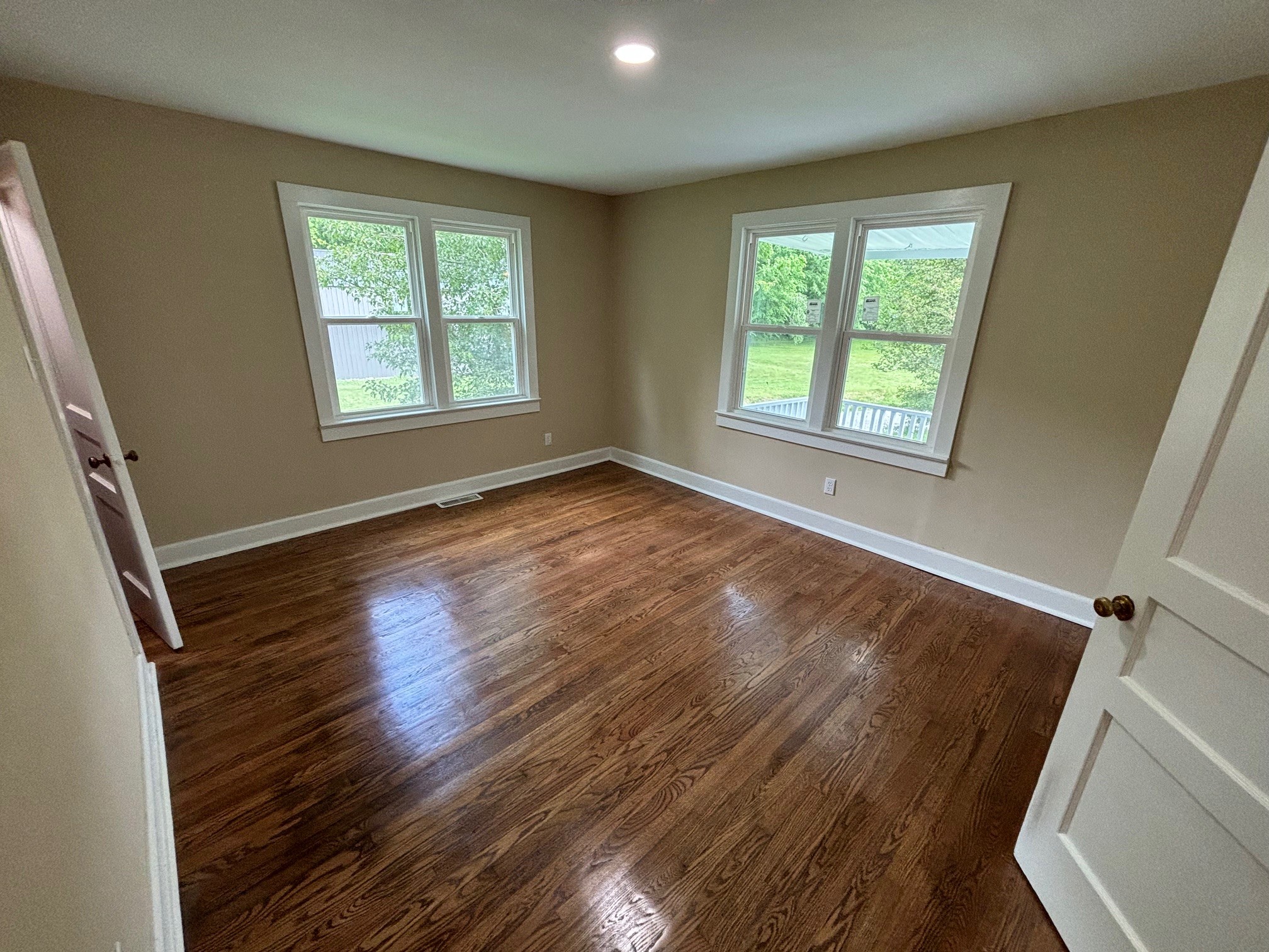 2692 Marble Hill Road Mulberry, TN 37359 - Photo 9 of 11 a view of an empty room with wooden floor and a window