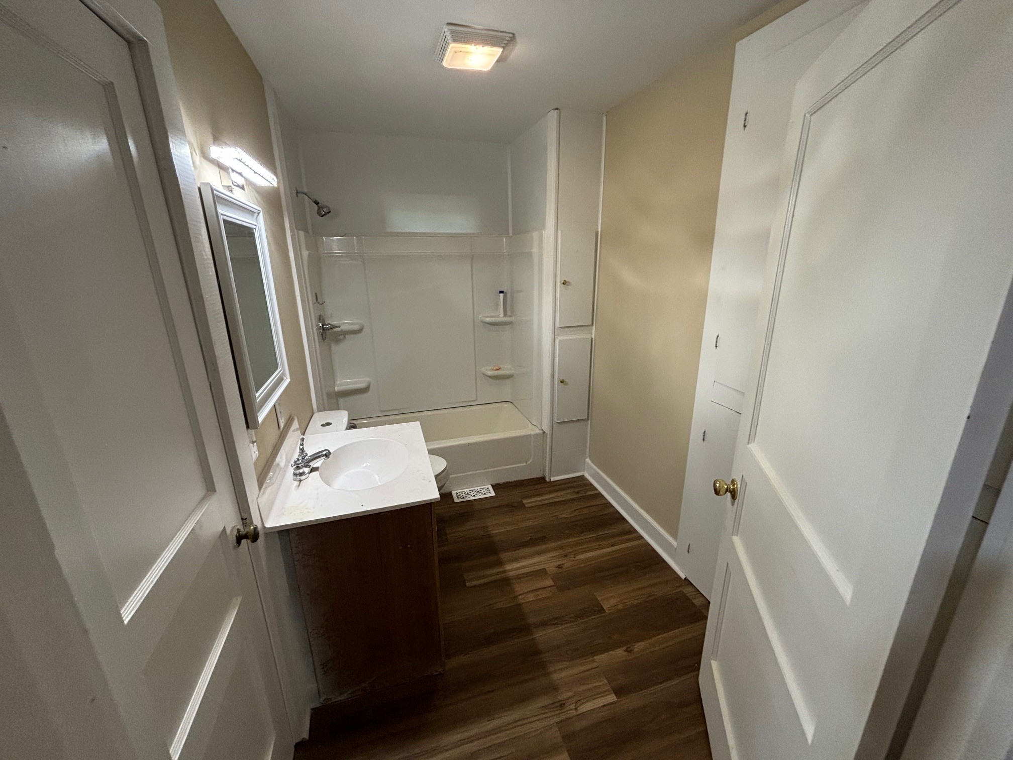 2692 Marble Hill Road Mulberry, TN 37359 - Photo 10 of 11 a bathroom with a sink a mirror and a shower