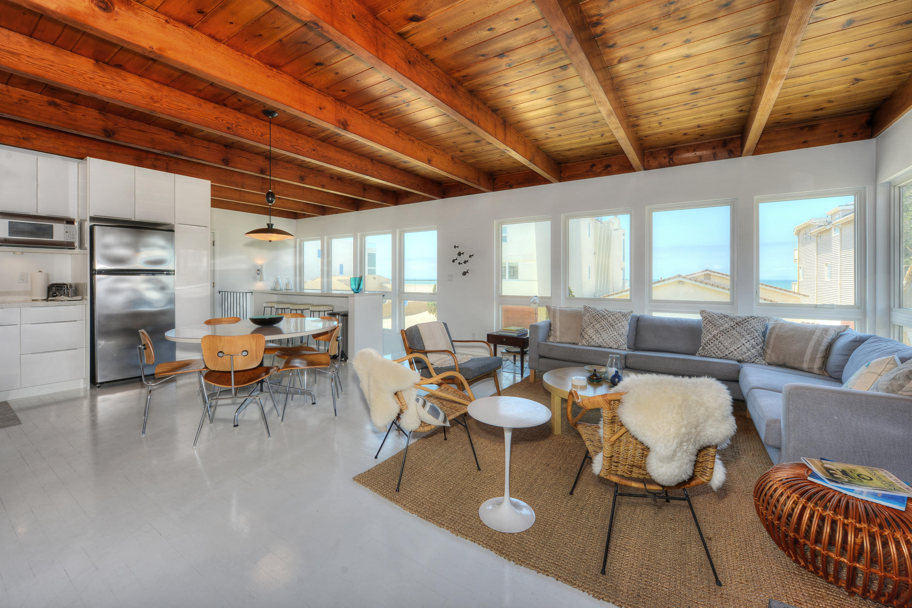 3600 Ocean Drive Oxnard, CA 93035 - Photo 18 of 30 a living room with lots of furniture and a table