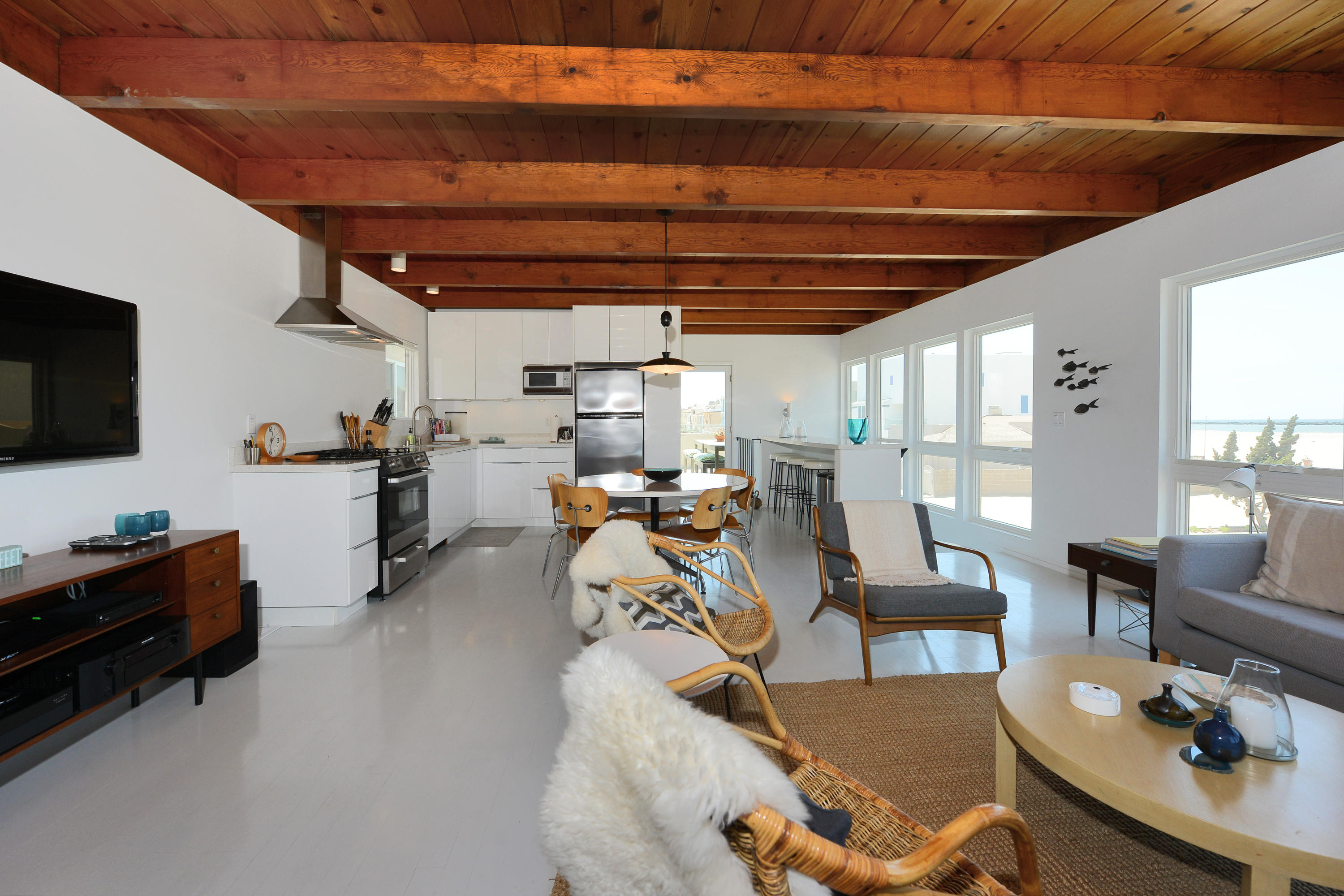 3600 Ocean Drive Oxnard, CA 93035 - Photo 23 of 30 a view of a livingroom with furniture and a flat screen tv