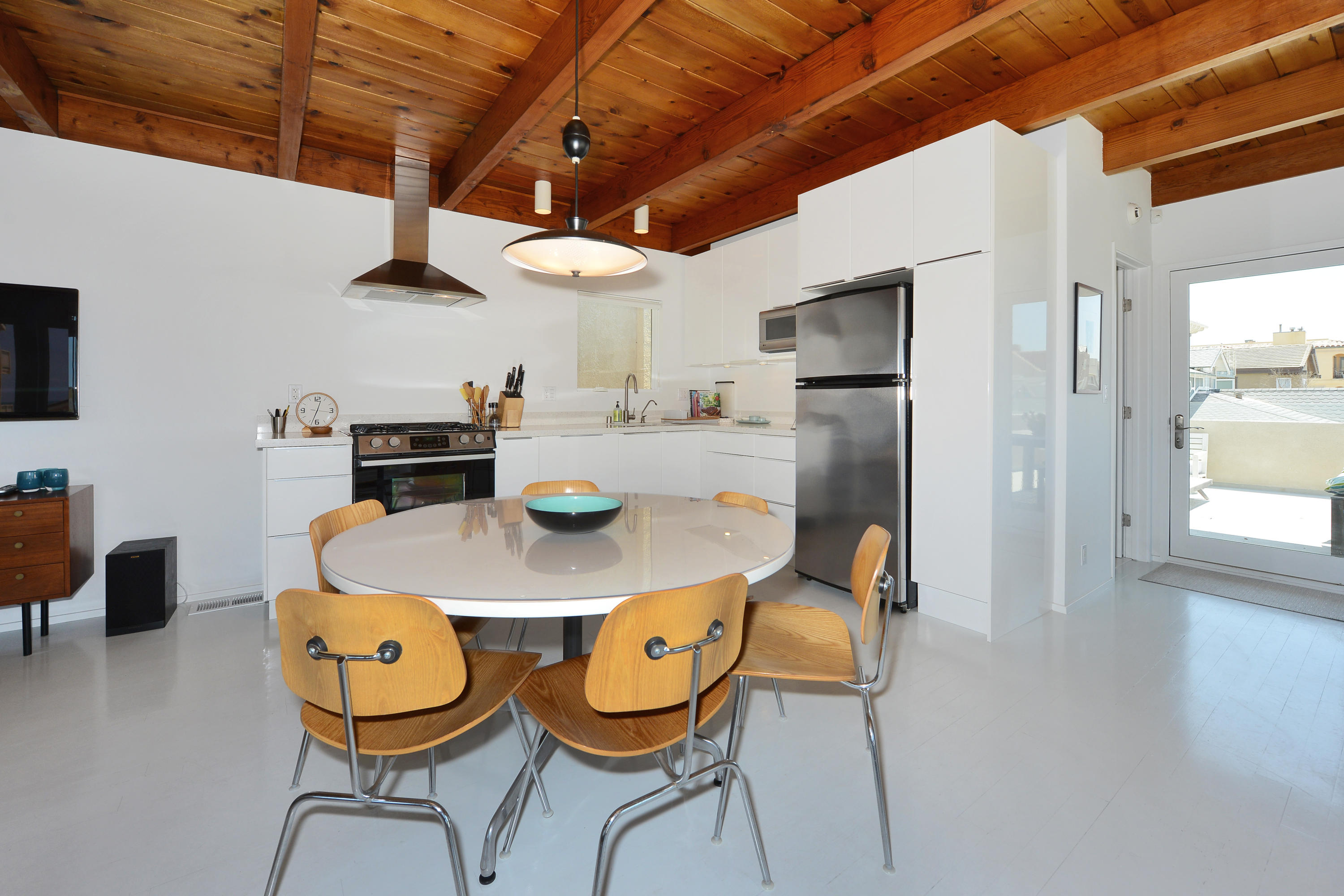 3600 Ocean Drive Oxnard, CA 93035 - Photo 25 of 30 a view of a dining room with furniture window and wooden floor
