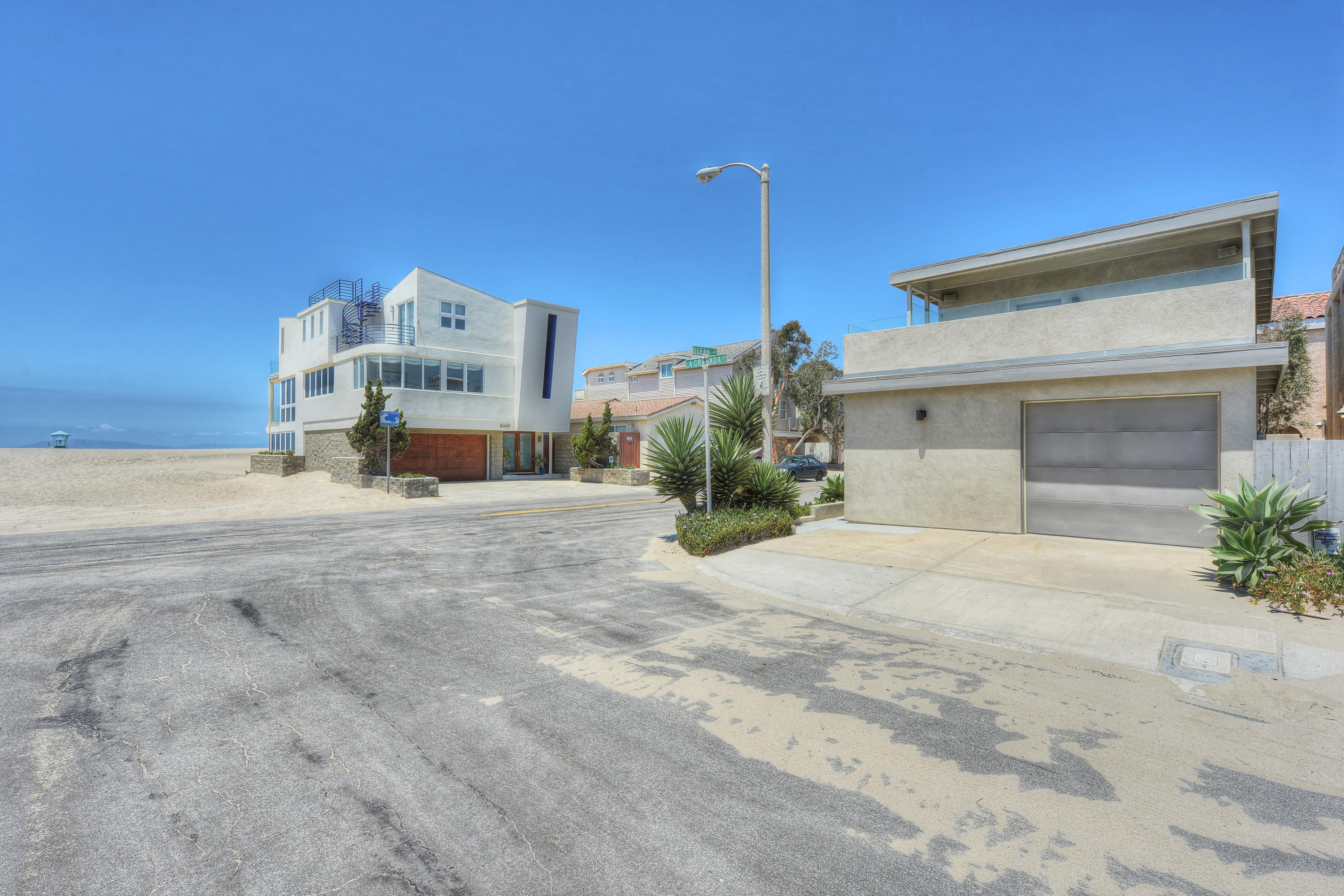 3600 Ocean Drive Oxnard, CA 93035 - Photo 4 of 30 a front view of a house with a yard and garage