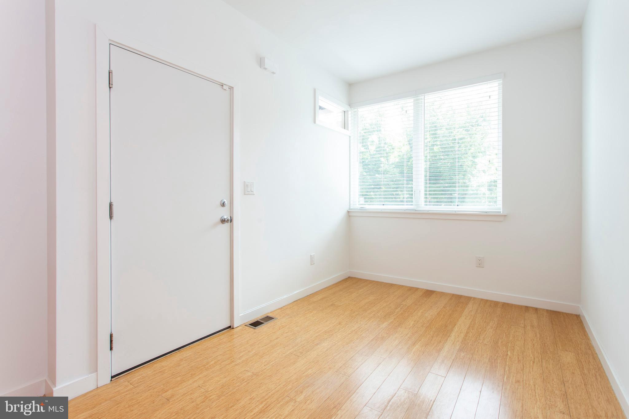 1519 Ogden Street, Unit 1 Philadelphia, PA 19130 - Photo 11 of 19 an empty room with a window
