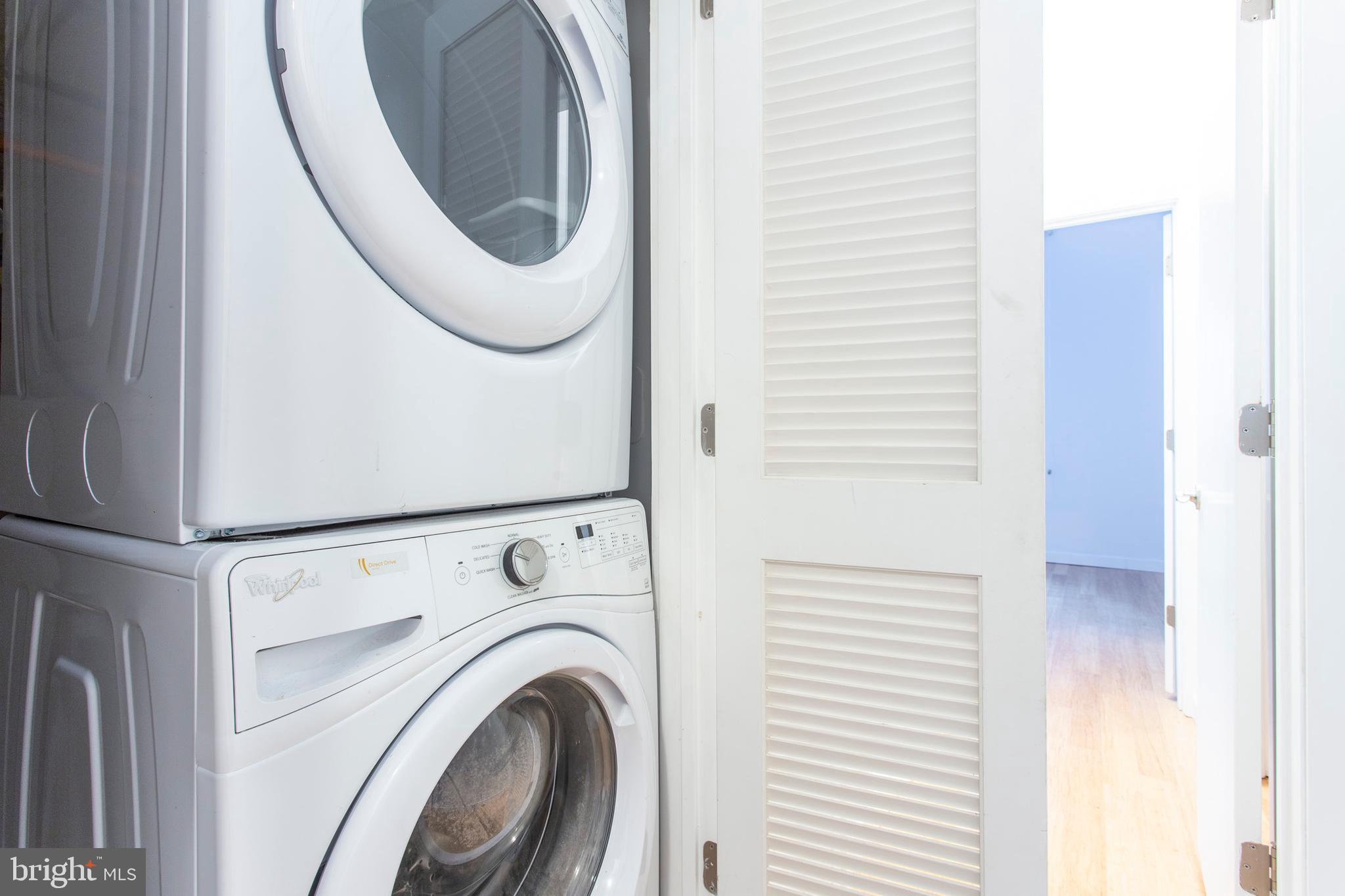 1519 Ogden Street, Unit 1 Philadelphia, PA 19130 - Photo 19 of 19 a utility room with dryer and washer