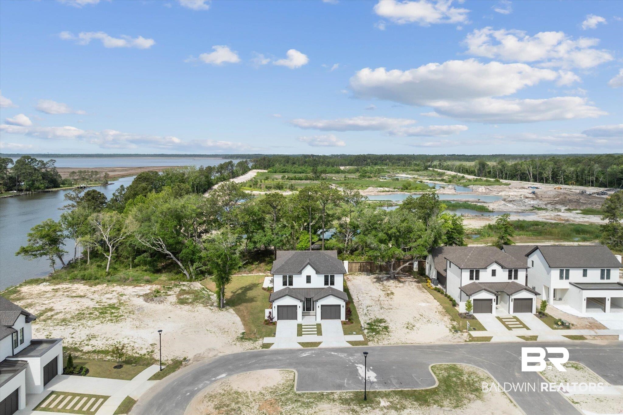 853 Inlet Circle Gulf Shores, AL 36542 - Photo 54 of 55 Drone / aerial view with a water view