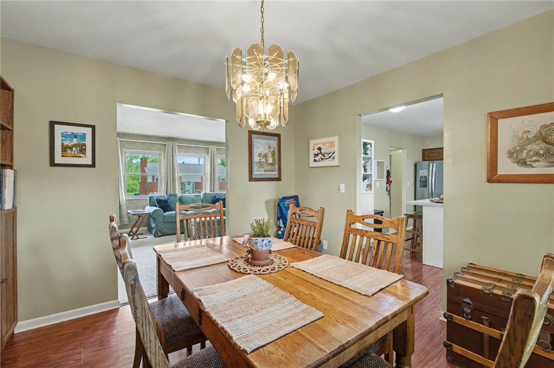 4919 Silver Arrow Drive Riverside, OH 45424 - Photo 13 of 57 This inviting dining area seamlessly connects to the living space, perfect for entertaining.