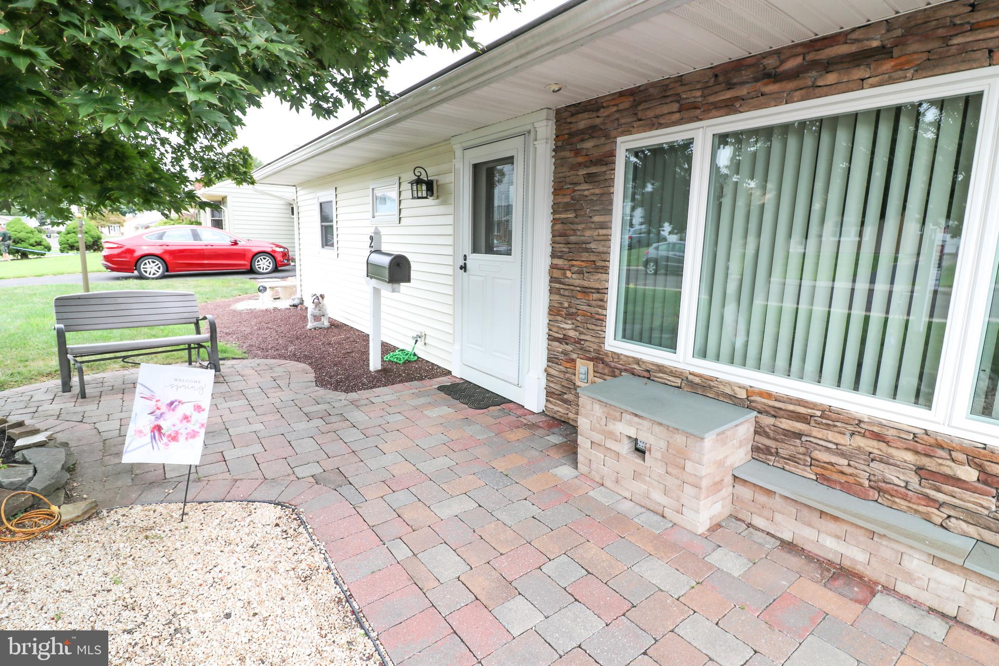 208 Andover Road Fairless Hills, PA 19030 - Photo 2 of 24 Custom Stacked Stone Front with Pavered Walk