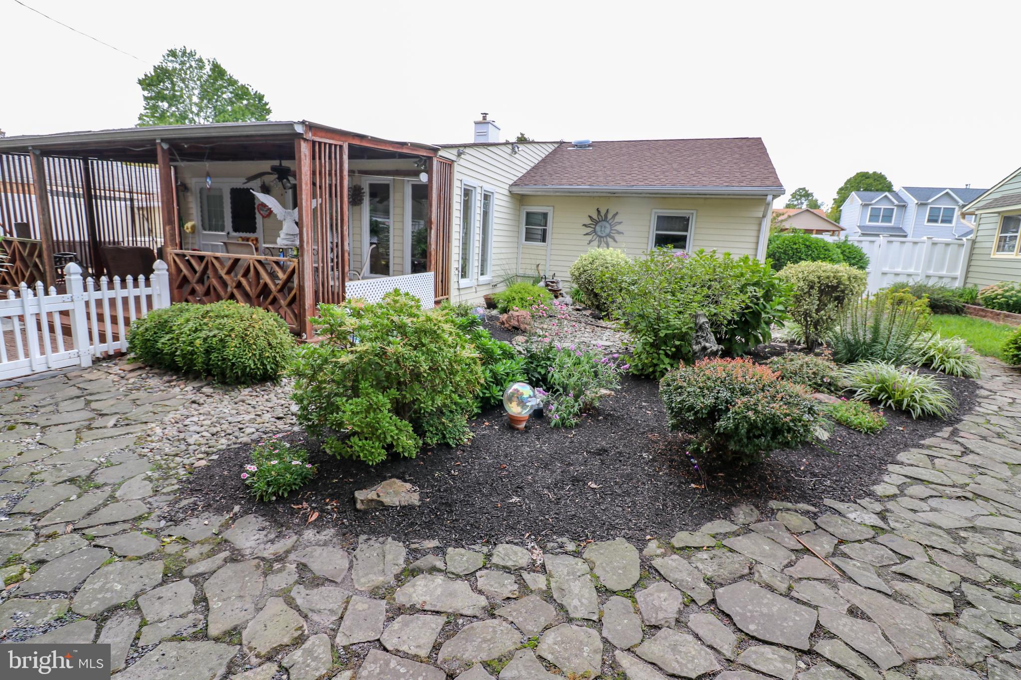 208 Andover Road Fairless Hills, PA 19030 - Photo 18 of 24 Custom Pavered Back with Prfessional Landscaping