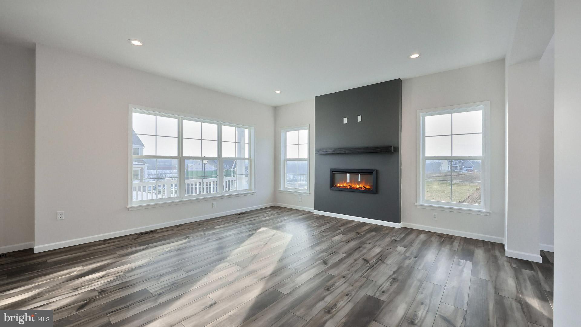 220 Copper Ridge Drive Newmanstown, PA 17073 - Photo 17 of 31 wooden floor in an empty room with a window