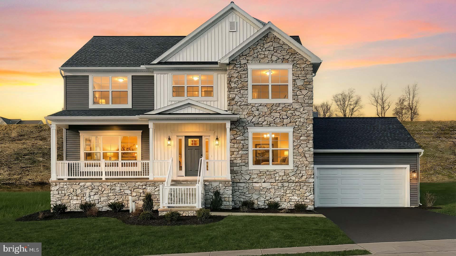 220 Copper Ridge Drive Newmanstown, PA 17073 - Photo 2 of 31 a front view of a house with a yard