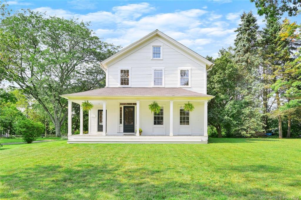 173 Sport Hill Road Easton, CT 06612 - Photo 1 of 1 a view of a house with yard and garden