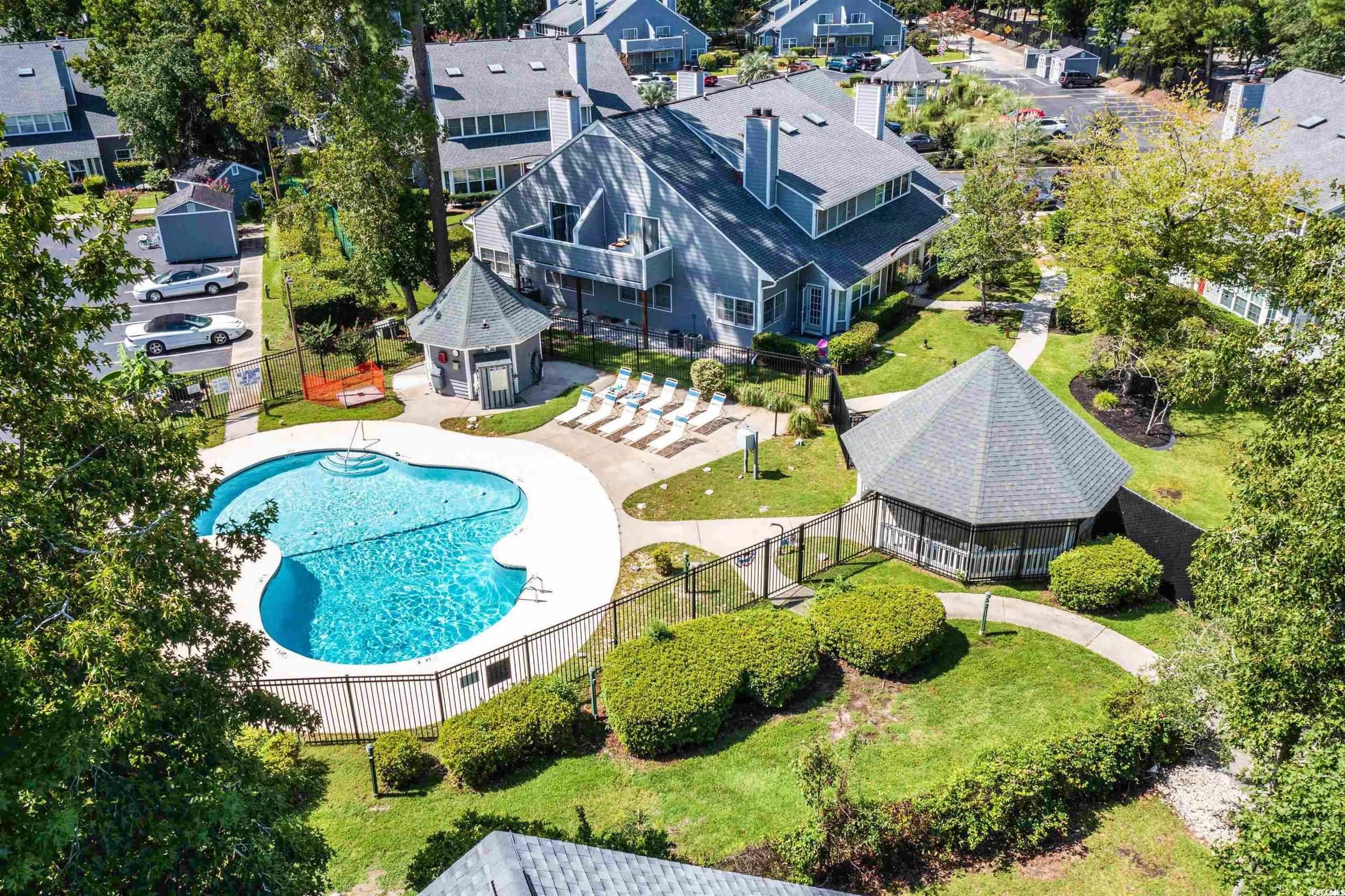 1200 Benna Drive, Unit 1C Myrtle Beach, SC 29577 - Photo 31 of 37 Bird's eye view of a pool