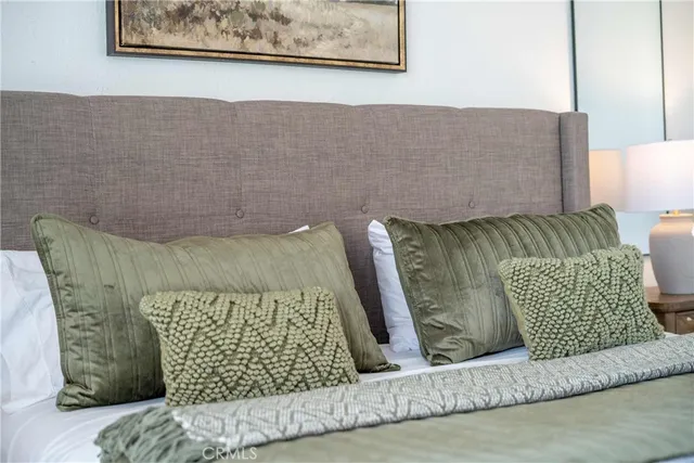 a view of a dining table and chairs in the patio