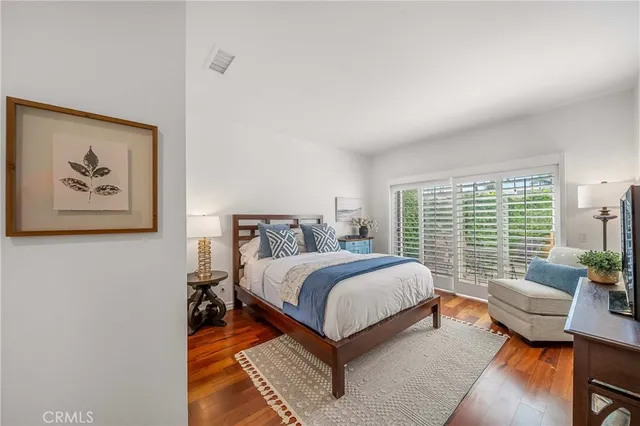 a view of a house with swimming pool and sitting area