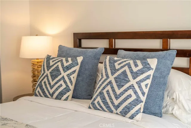 a view of a house with swimming pool and sitting area