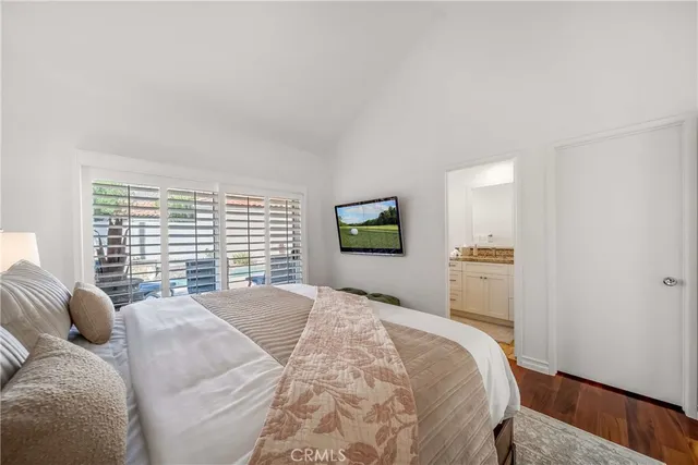 a view of an outdoor dining space with a table and chairs