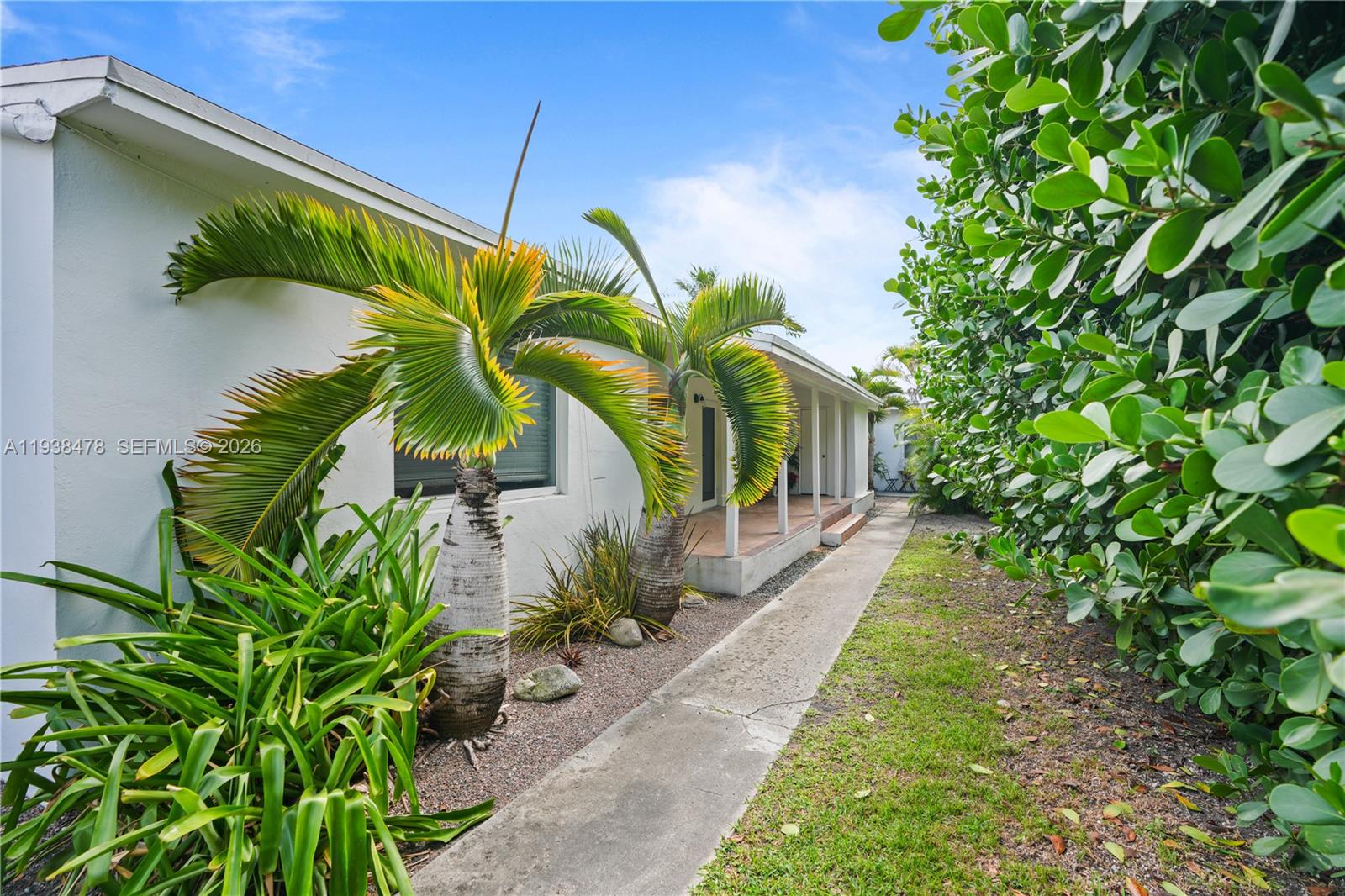 550 Northeast 68th Street, Unit 550 Miami, FL 33138 - Photo 12 of 15 a picture of a yard with plants