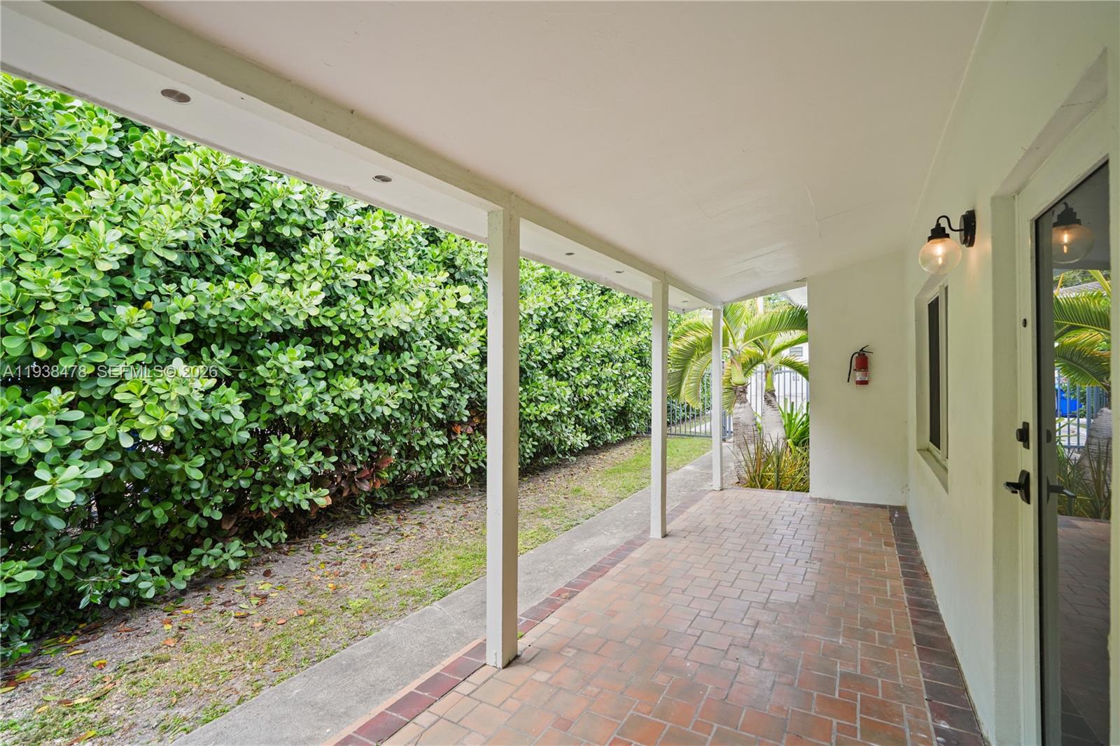 550 Northeast 68th Street, Unit 550 Miami, FL 33138 - Photo 14 of 15 a view of entryway with garden