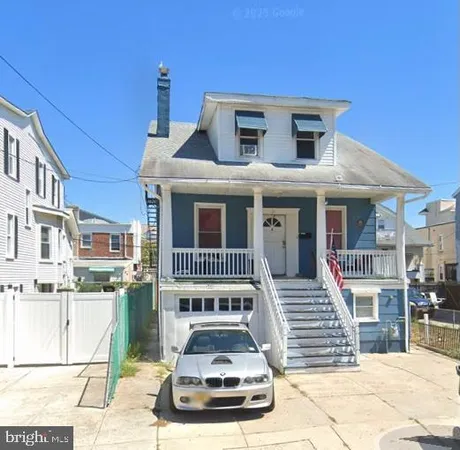 a car parked in front of a house